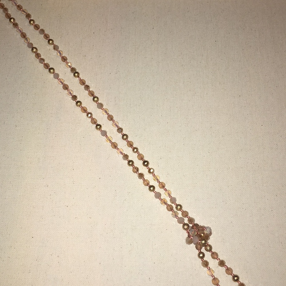 Francesca's long beaded glass-metal necklace